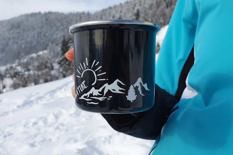 Outdoor mug with Manigod logo
